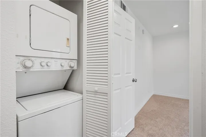 In unit stackable laundry