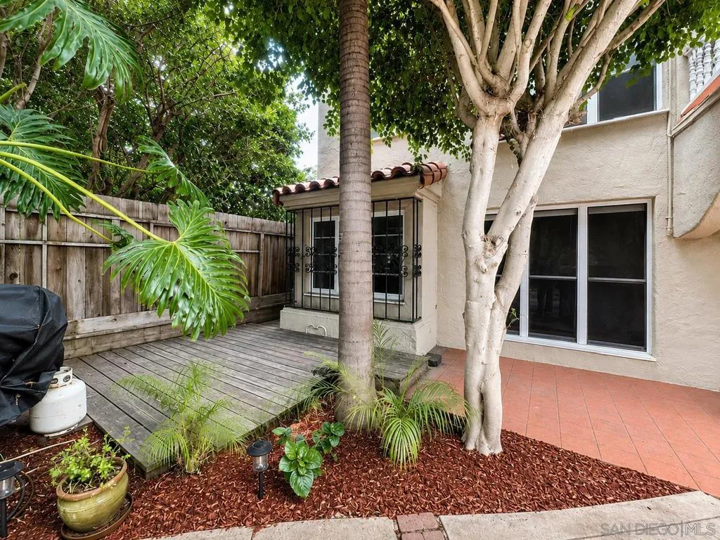 Separate 2 story building with downstairs 1BD/1BA, and upstairs two 2BD/1BA units.