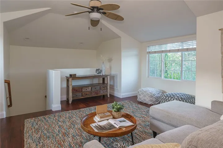 Light filled loft space can be used as a media room, craft/art space, library, or guest room.