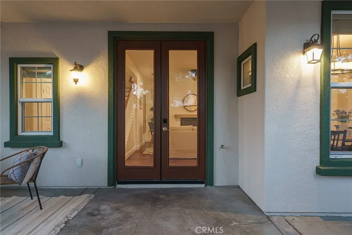 Connecting the great room kitchen area to outdoor seating areas through a beautiful set of french doors makes this home the perfect place to entertain family and friends.