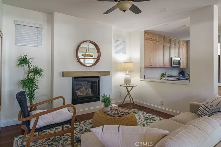 First level spectacular family room dining and kitchen open floorplan. Note: Interior fresh repaint in Coconut Twist and Swiss Coffee, all new Acacia engineered wood flooring throughout.  Custom Roman Shades throughout.