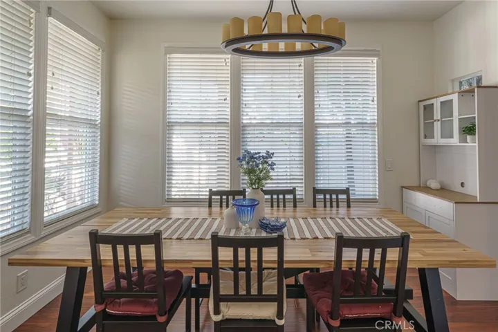 Another view of the dining area standing in the kitchen.