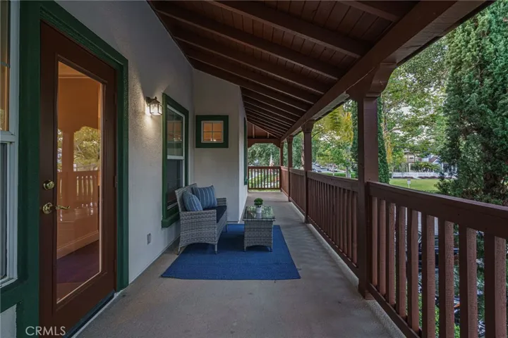 Coffee or wine with a good book in your own private outdoor space off of the primary bedroom.