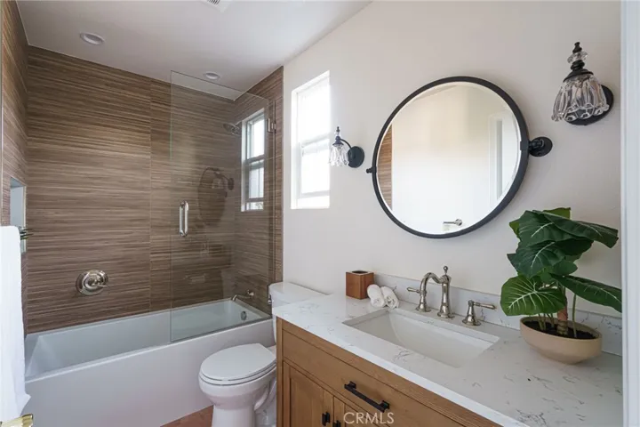 Jack and Jill bedrooms share this stunning beautifull remodeled bathroom.