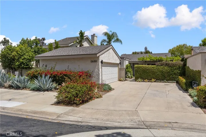 Driveway and two-car garage.