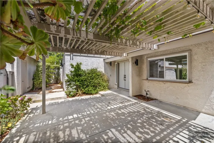 Private, gated front courtyard.