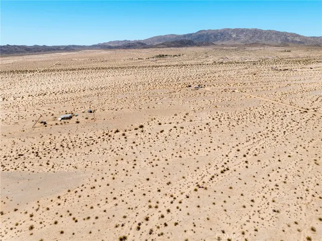 Sweeping view across the raw land, perfect for envisioning a custom estate or multi-structure luxury glamping retreat.