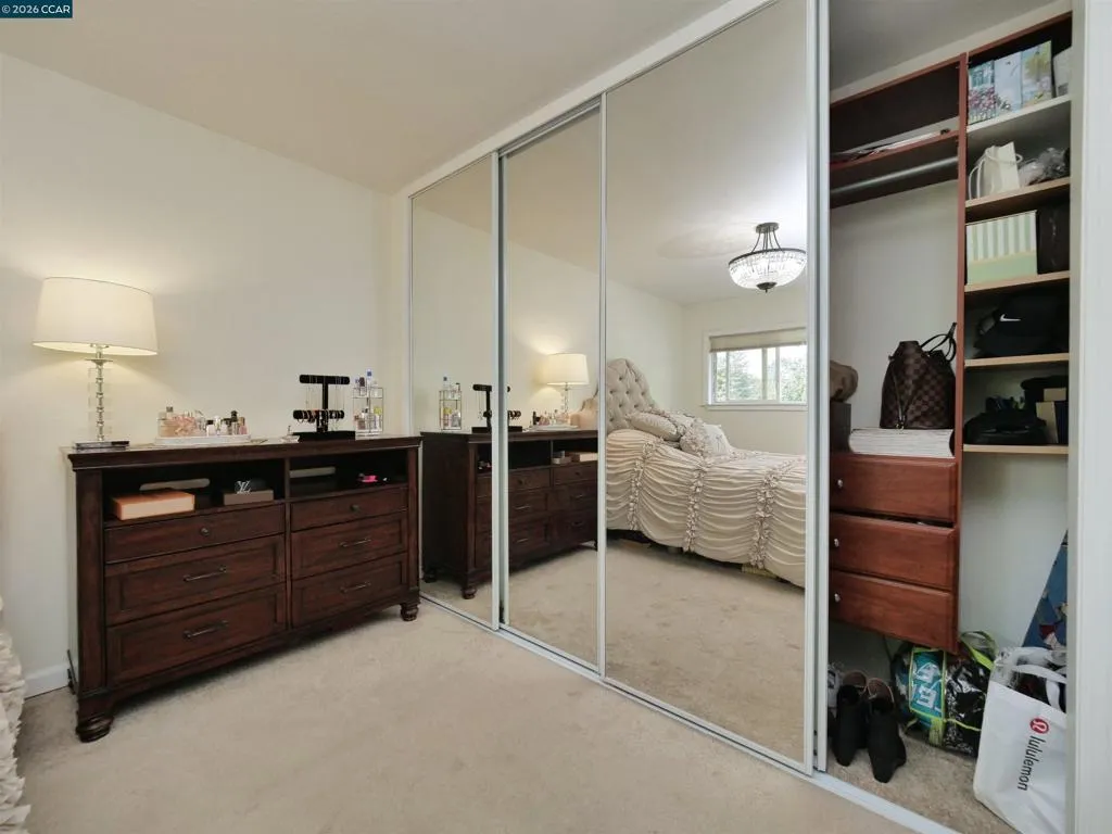Custom closet organization with mirrored doors!