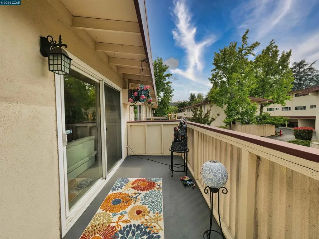 Private long balcony with garden views!