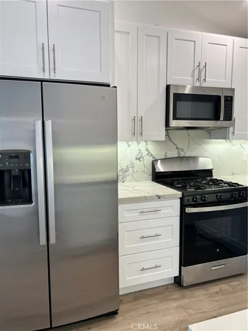 Kitchen with stainless steel appliances