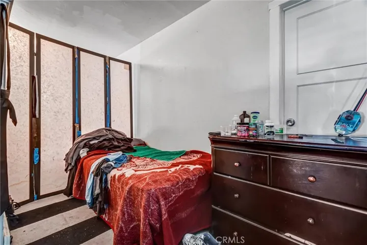 Upstairs unit- sleeping area in living room