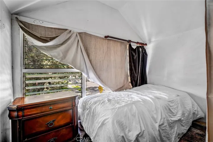 Upstairs unit- sleeping area in living room
