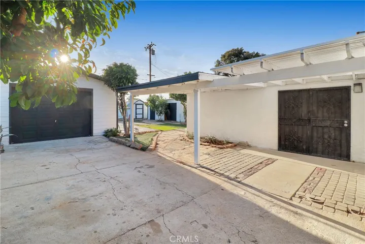 Outside Patio and View of Detached 2 Car Garage.