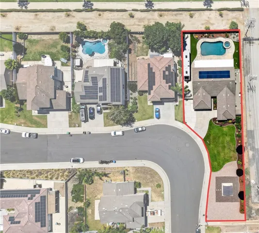 Extensive +15,000 square foot lot with RV parking, pool, spa, solar and park-inspired yard