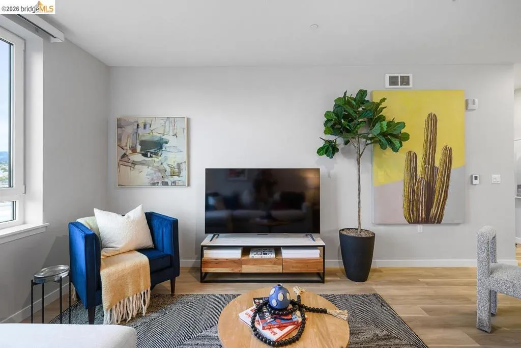 Living room featuring wood finished floors and baseboards