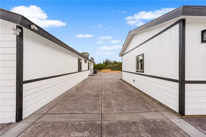 Space between home & 2nd 2-car garage