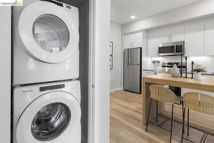Stackable white laundry appliances