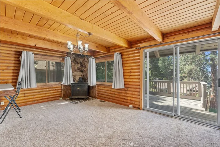 Living room with dining area open to kitchen.