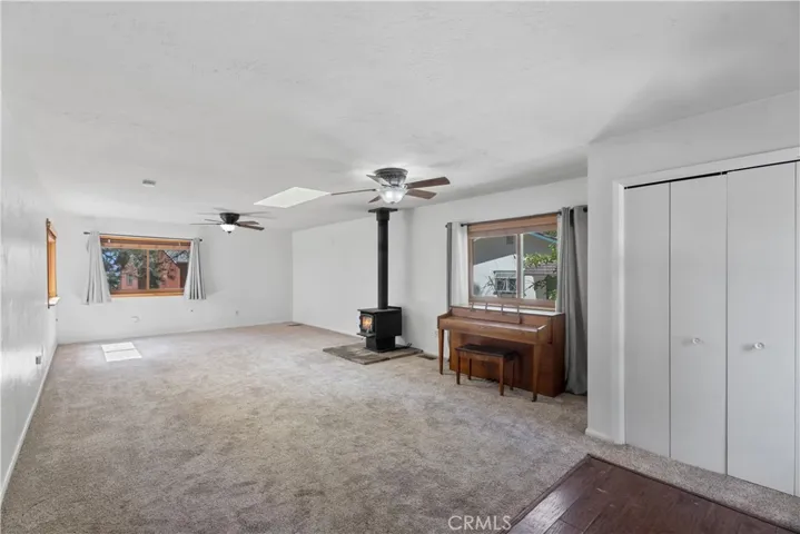 Large Family room with wood burning stove.