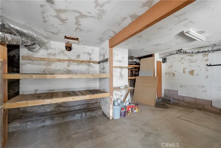 Unfinished work shop storage area.