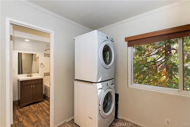Second floor landing with laundry.
