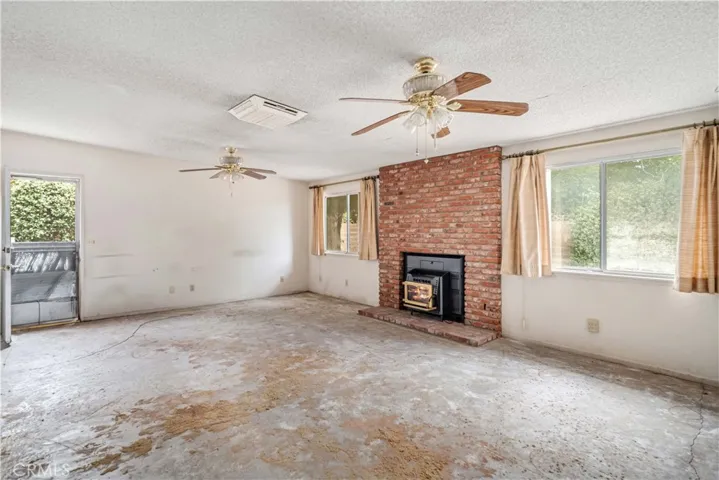 Virtually staged/enhanced to add fire in fireplace