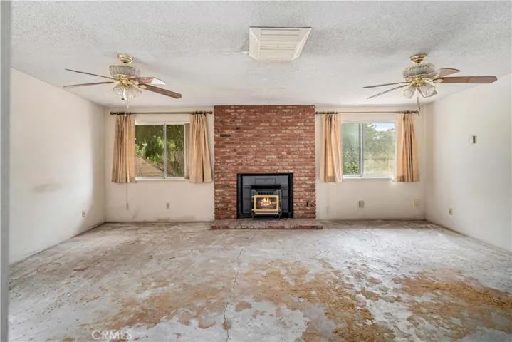 Virtually staged/enhanced to add fire in fireplace