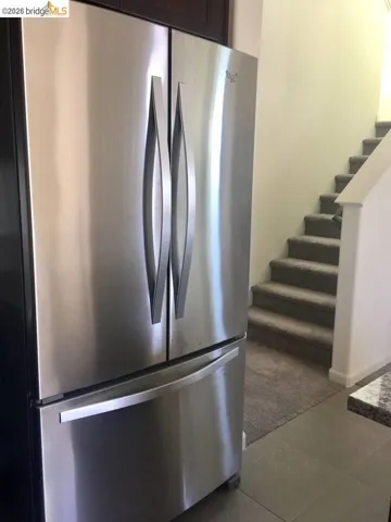 Stainless steel French door refrigerator with a bottom freezer drawer