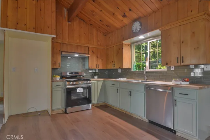 Kitchen - Notice the shaker style cabinets recently installed with the butcherblock countertops.