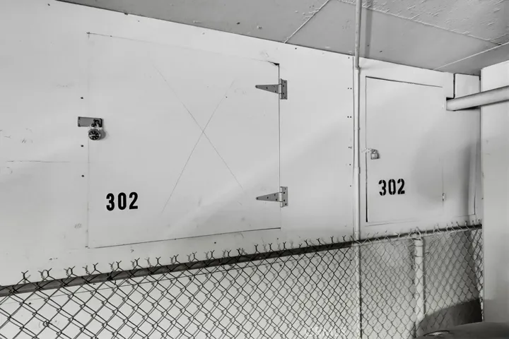 Two storage cabinets at parking space