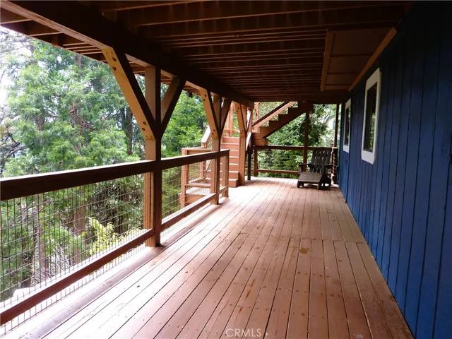 As you walk out of the bonus room on the lo
wer level, you're on the full length covered deck.