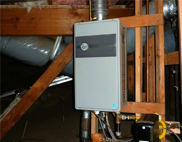 The home has a tankless water heater located in the build up area.