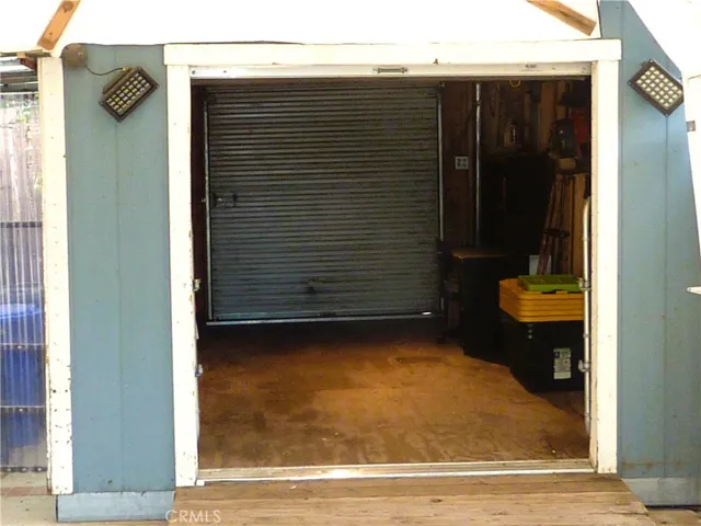 Lots of storage space in the shed at the end of the driveway. Also, the door at the other end of the shed opens up to give you easy access to the rear yard.