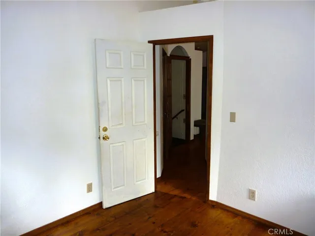 The rear bedroom on the main level is also just off the living area of the home.
