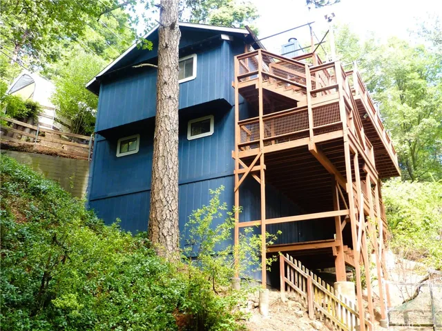 This is the west side of the home looking up from the back yard.