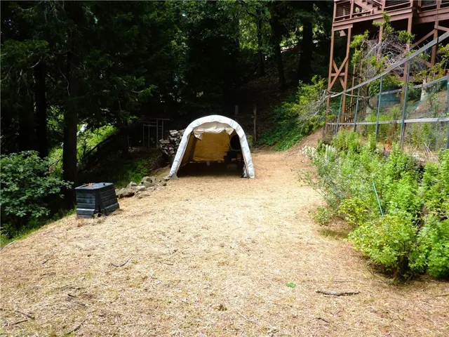 Level entry to the covered storage in the rear of the home.