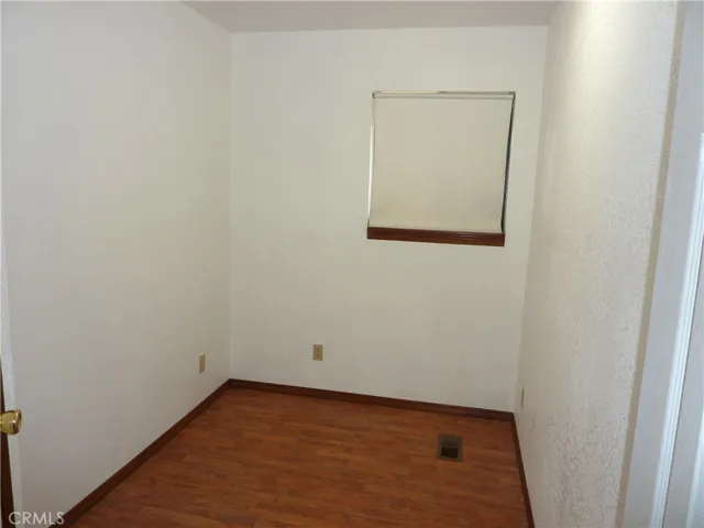 This is a small bedroom on the lower level that is right next to the master bedroom. It could be easily used for a nursery.