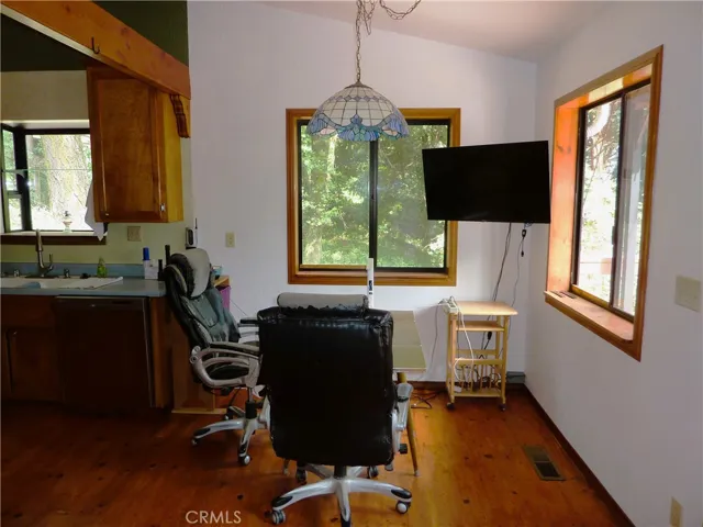 Right next to the kitchen is the dining area which has a nice mountain view from the window.