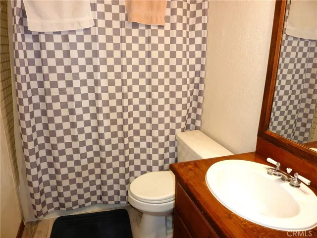 Full bath on the main level is just as you enter the front door and just off the living room.
