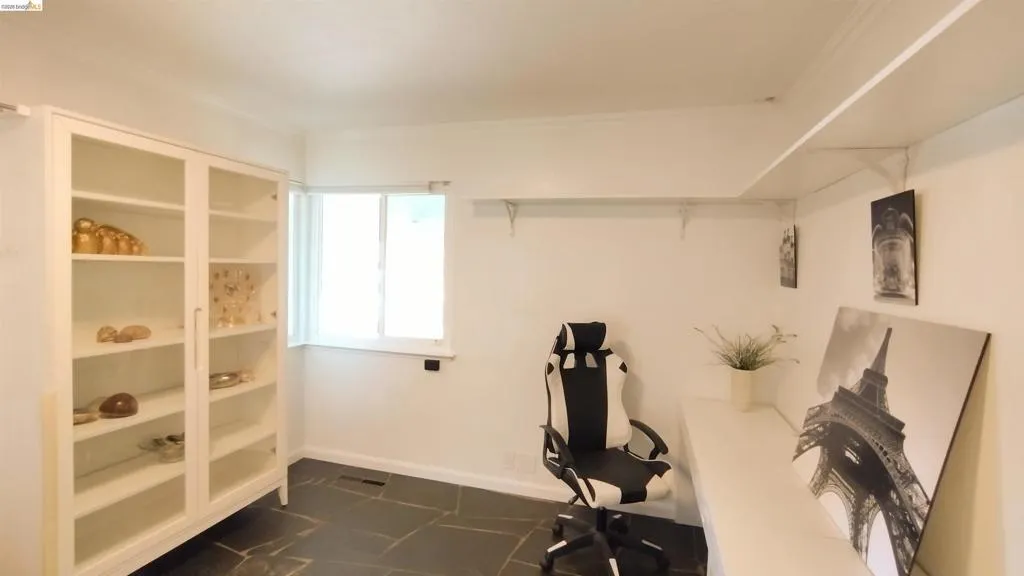 Home office featuring baseboards