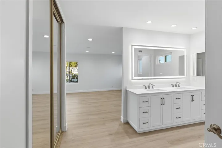Primary Bedroom and Bath with double sinks.
