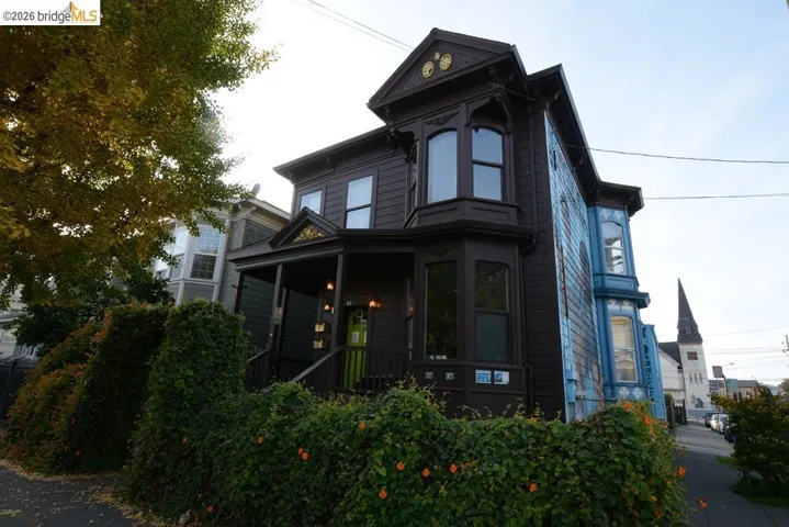 View of property exterior with covered porch