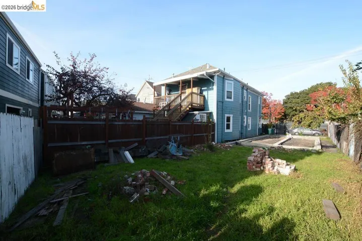 View of fenced backyard