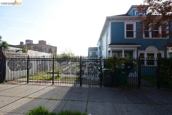 Gate with a fenced front yard