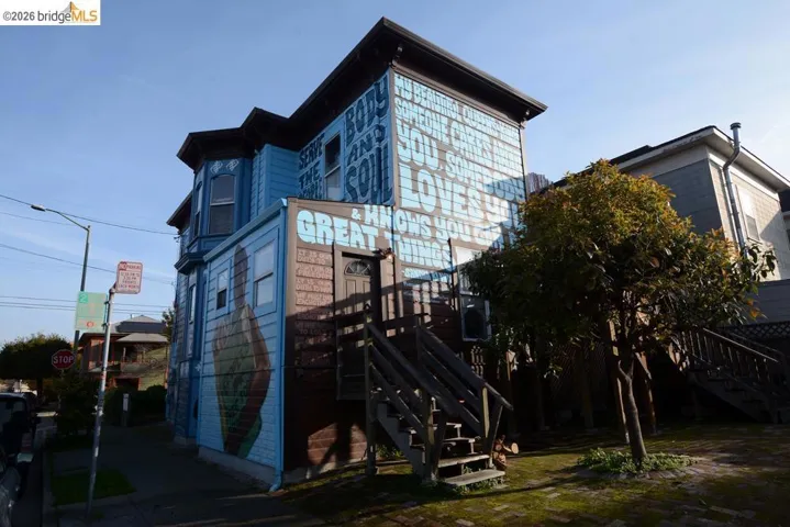 View of home's exterior featuring stairway