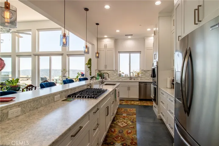 Modern kitchen with island and Sierra Nevada views