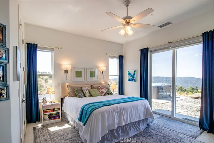 Master bedroom with private patio access