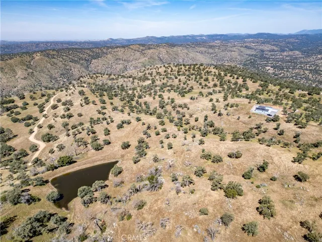The 220-acre context — home, pond, hills