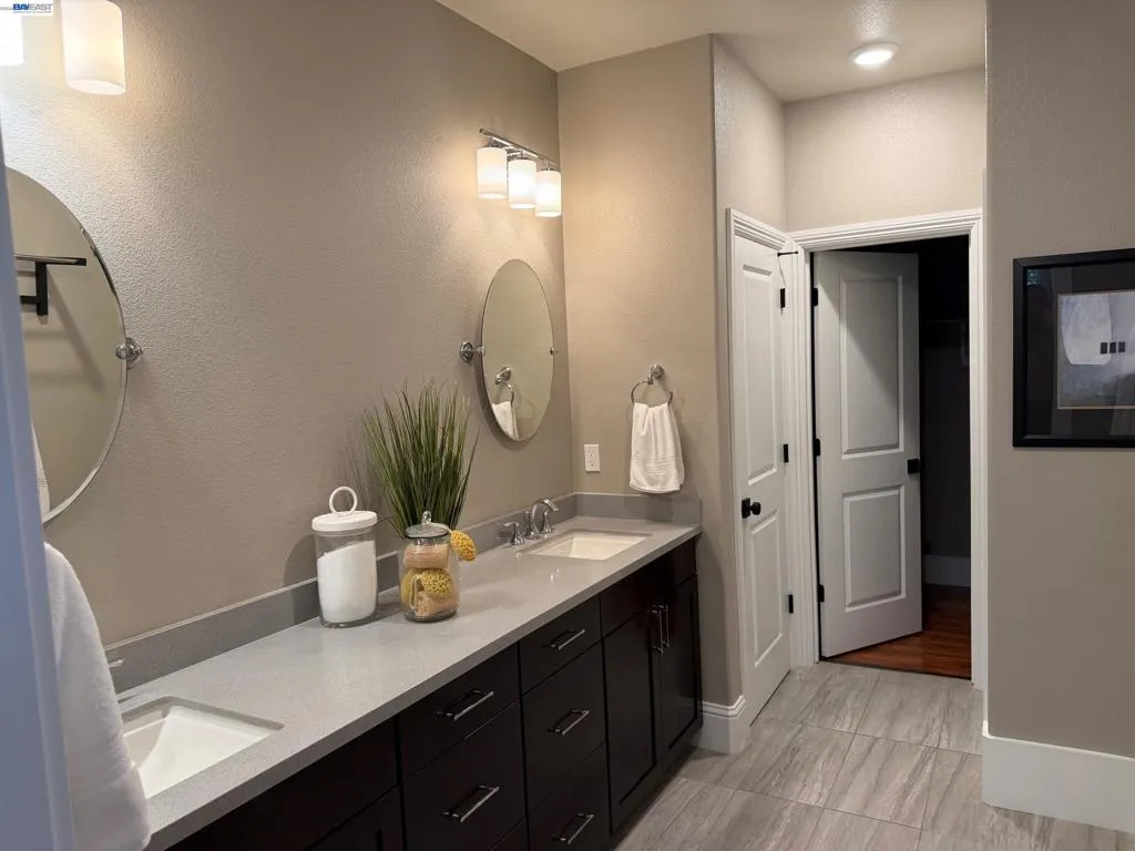 Primary Bathroom with linen closet and walk-in closet.