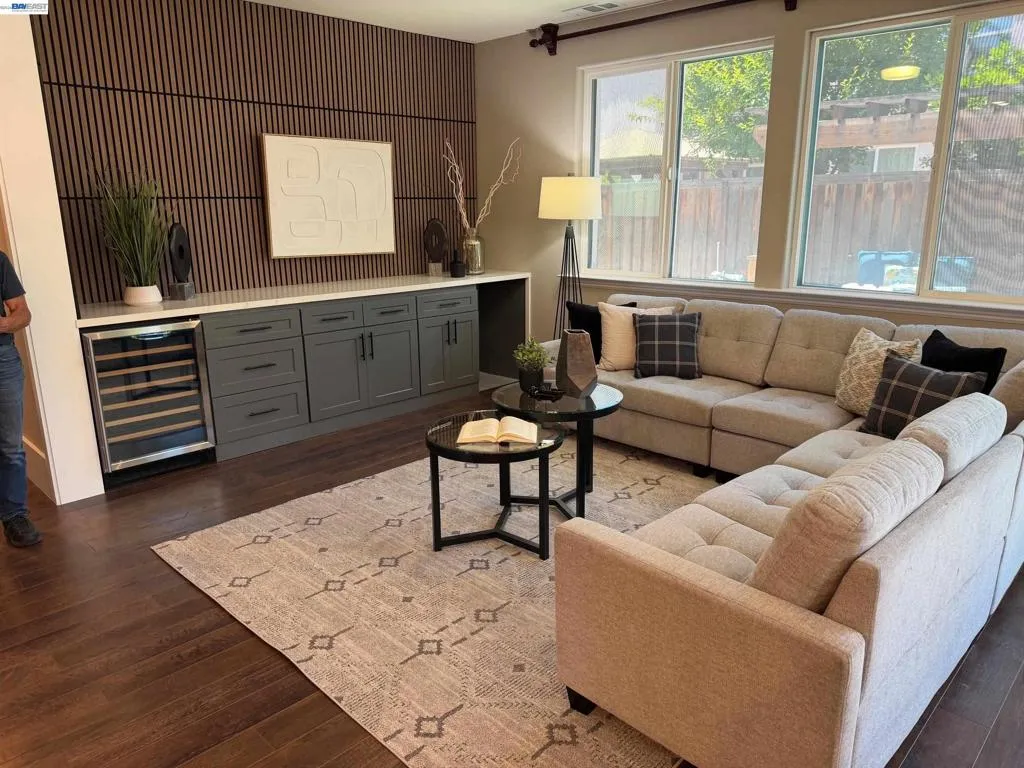 Family Room with custom built in cabinet, wine fridge and audio/video hookups